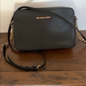 Michael Kors black and gold shoulder bag